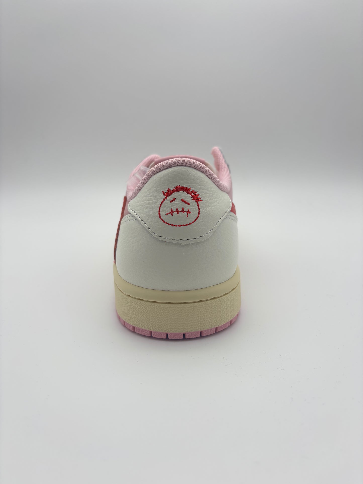 JORDAN 1 LOW TRAVIS SCOTT TROPICAL PINK