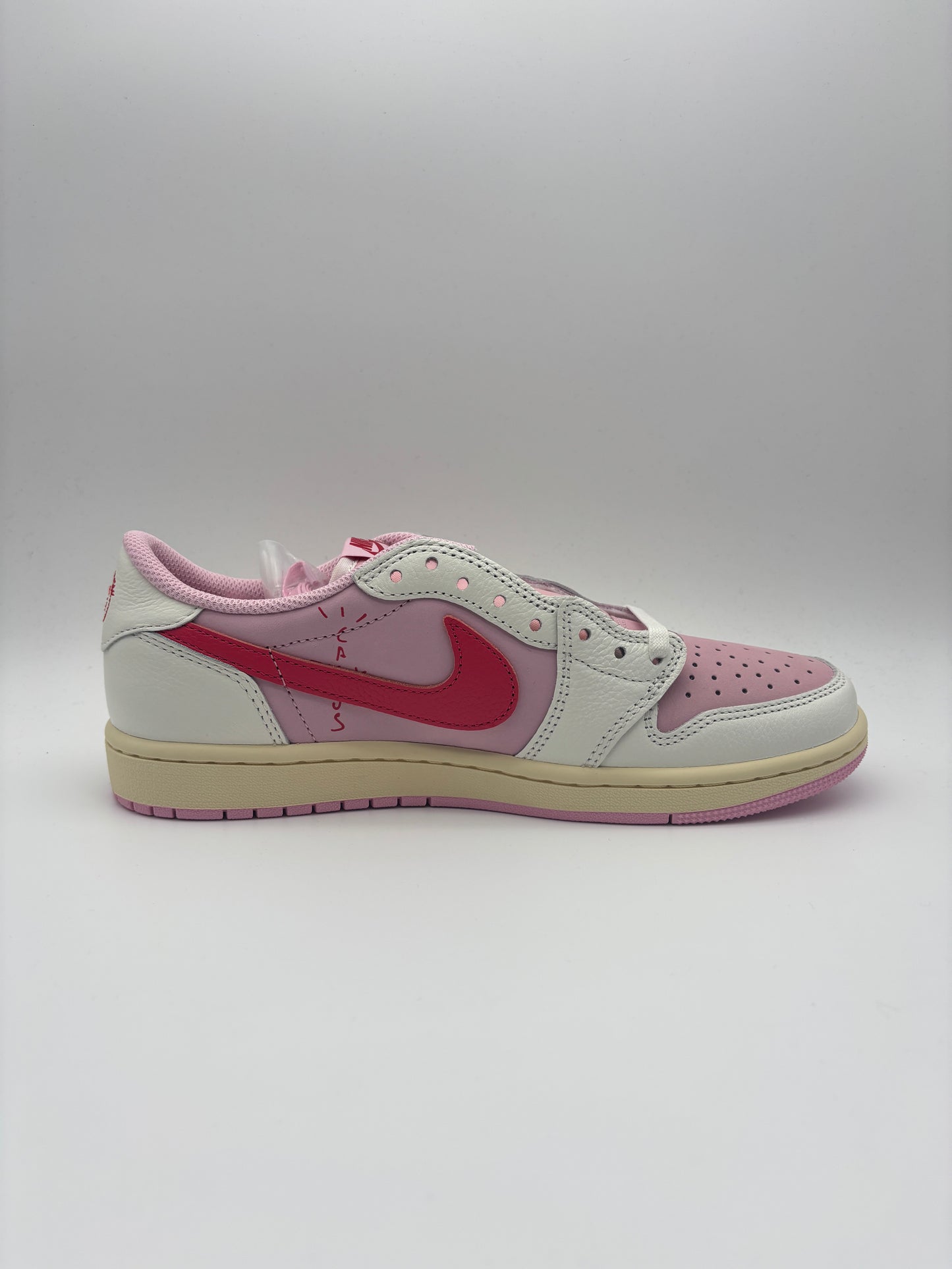 JORDAN 1 LOW TRAVIS SCOTT TROPICAL PINK